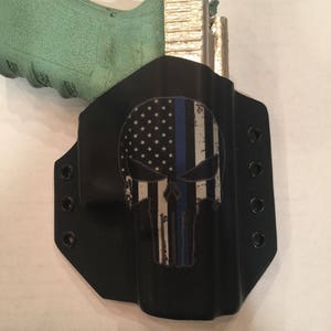 Punisher Thin Blue Line holster for Glock or smith and wesson handguns.