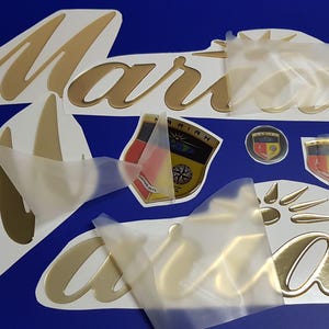 Mariah-bootemblemen 28" goud + GRATIS SNELLE levering DHL Express - Stickersset - Grafische sticker