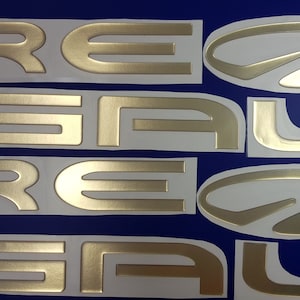 Regal Boat-emblemen 47" goud + GRATIS SNELLE levering DHL Express-stickers - Stickersset - Grafische sticker