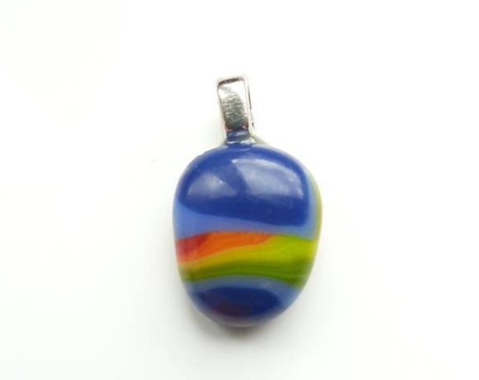 Blue with midway rainbow, fused glass, medium sized pendant.