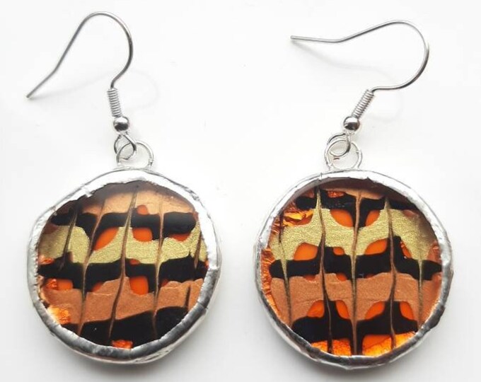 Gorgeous copper, gold and black, round, painted earrings. Set with copper foil method.