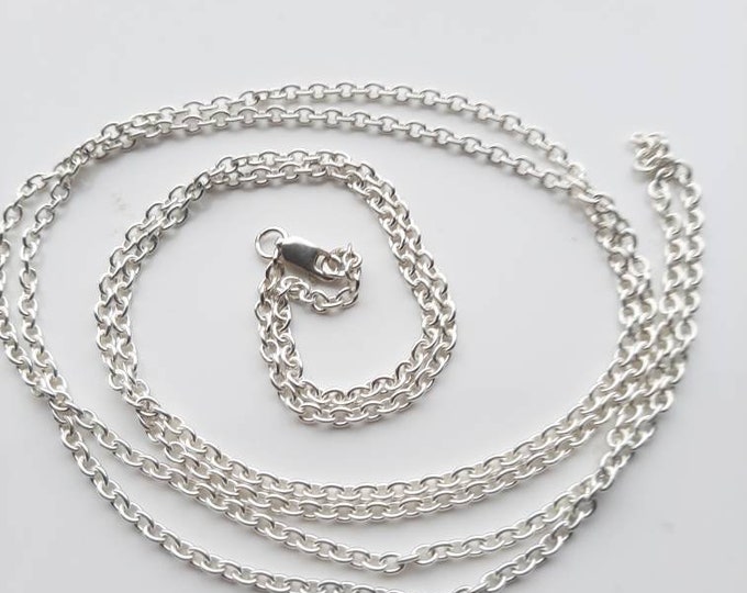 40 inch long, solid silver, hallmarked, 3.5mm wide, trace or cable chain. London Assay Office hallmarked.