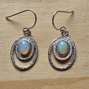 Gorgeous Ethiopian opal and sterling silver, textured drop earrings.
