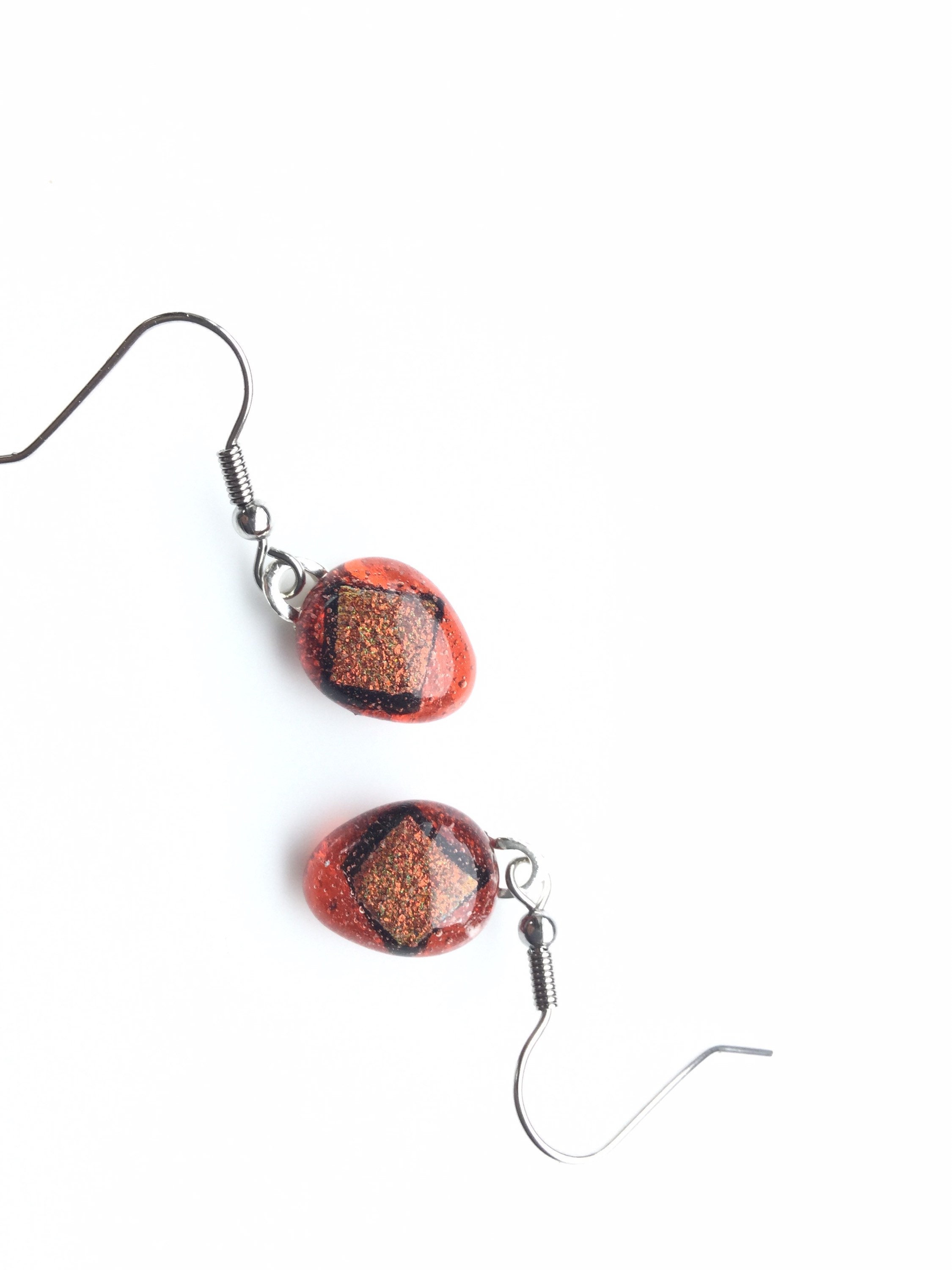 Pretty orange dichroic teardrop quirky earrings. Vibrant Etsy
