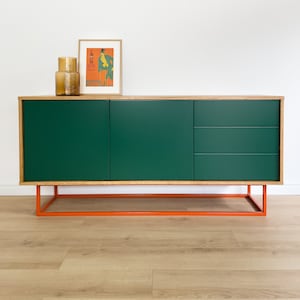 Natural oak sideboard with green doors and orange base