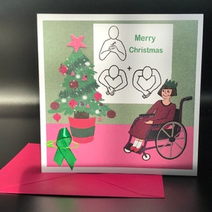 Feliz Navidad makaton tarjeta de necesidades especiales para sillas de ruedas