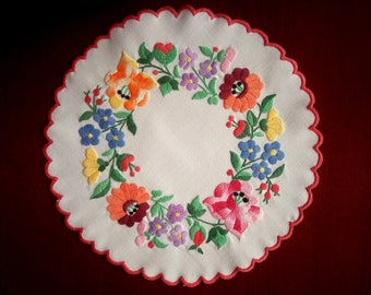 Hand embroidered Hungarian 11" vintage doily with authentic Kalocsa embroidery.