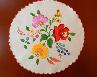 Hand embroidered Hungarian 12" vintage round doily with authentic Kalocsa embroidery.