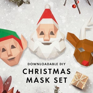 Könnte beinhalten: Ein Set mit drei druckbaren Weihnachtsmasken, die den Weihnachtsmann, einen Elf und ein Rentier zeigen. Die Masken sind aus Papier und zum Ausschneiden und Zusammenbauen gedacht. Der Text "Downloadable DIY Christmas Mask Set" ist unter den Masken gedruckt.