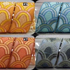 The image is a collage of four different fabric swatches, each with a unique wave pattern design. The swatches are arranged in a grid format, with each row containing two fabric swatches. The swatches are displayed in various colors, including orange, blue, gray, and green, showcasing the diverse wave patterns available.