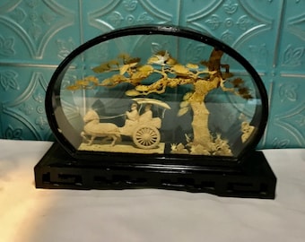 Oval Carved Cork Scene