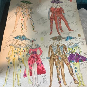 May include: Hand-drawn sketches of various costume designs featuring different colors and patterns. The designs include a variety of styles, such as a clown, a jester, and a princess. The sketches are detailed and include notes about the materials and construction of the costumes.