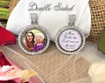 May include: Double-sided memorial charm featuring a photo of two women on one side and a message that reads "Mimi, On this day I will miss you the most. 04.19.2022" on the other side. The charm is silver with a clear crystal border.