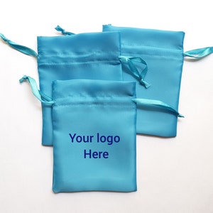 Set of 100 Drawstring sky blue satin jewelry pouch for prefect jewelry packing, favor and gift purpose bags, custom logo pouch, logo bag