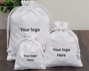 100 sacs à cordon en coton blanc : pochettes avec logo personnalisé