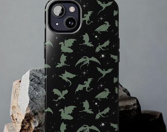 May include: Black phone case with a green dragon silhouette pattern on a black background. The case has a camera cutout and a white star pattern.