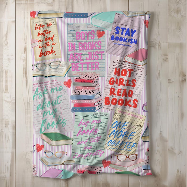 May include: A patterned blanket with a book theme. The design includes book stacks, eyeglasses, and text like "Boys in books are just better" and "Hot girls read books." The background has pink and white stripes.