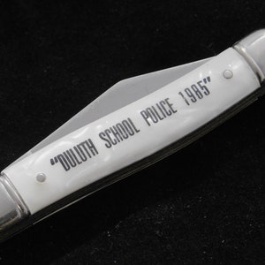 Navaja de bolsillo coleccionable vintage de la policía escolar de Duluth