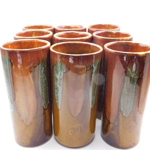 Dryden Drip Glaze Pottery. Set of nine water glasses.