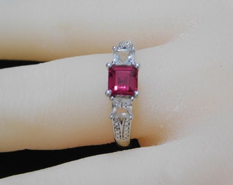 Vintage Collectible Sterling Silver Ring with nice Ruby center stone.