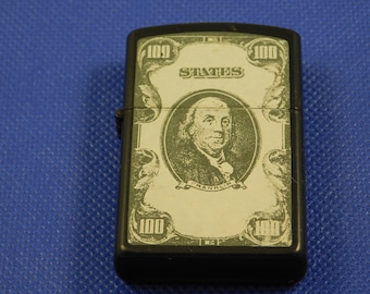 Vintage Collectible Cigarette Lighter with 100 dollar bill.