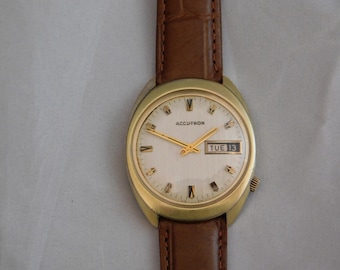 Vintage verzamelobject Bulova Accutron Day Date 10KT gerolde gouden plaat