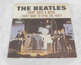 Copertina e disco dei Beatles a 45 giri
