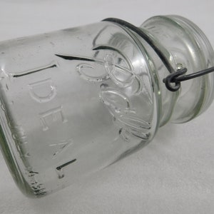 Vintage Collectible Ball Ideal Clear Canning Jar with wire top.