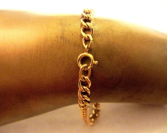 Pulsera con dijes nueva de oro macizo de 12 k (1/20) - 7 1/4" x 5 mm - 7,80 gramos - Ver fotos