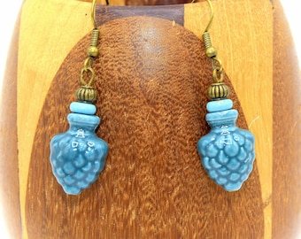 Turquoise ceramic pine cone earrings, symbol of spiritual awakening