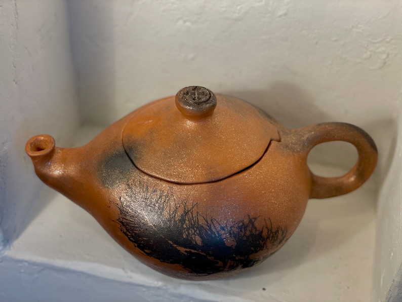 Micaceous Tea Pot marked with Feather