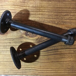 A pair of Industrial Shelf Brackets for Floating Wood and Pipe Shelf. Rustic Industrial Wood floating shelf pipe brackets. image 2