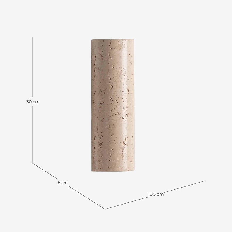May include: A cylindrical, beige stone vase, 30 cm tall, with a textured surface. The vase is 10.5 cm wide and 5 cm deep. The neutral color and simple design make it suitable for various decor styles.