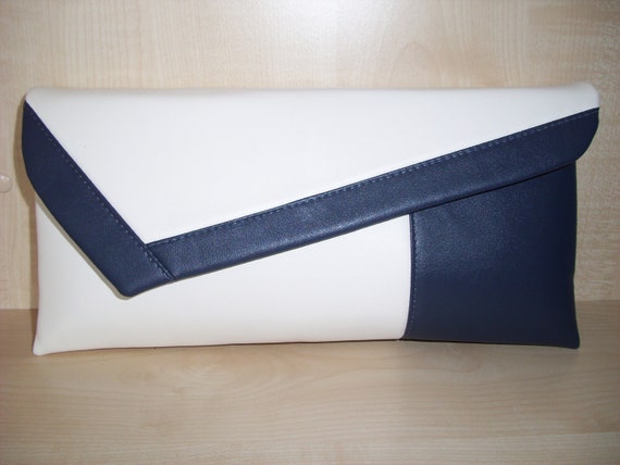navy and cream clutch bag