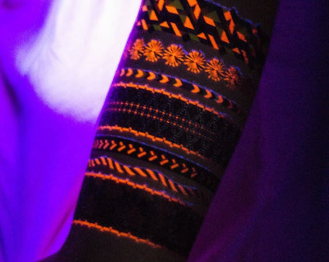 Friendship Bracelet Temporary Tattoo Neon Glow under Black Light Festival and Club. Colorful and Fun. Geometric shapes