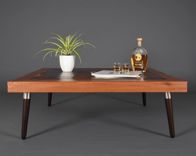 Mid-century square coffee table in leather and wood