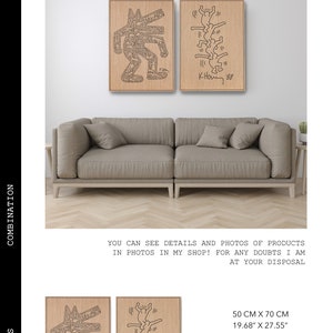 May include: Two wood-mounted prints of black and white line drawings by artist Keith Haring. The prints are framed in a light wood frame. The prints are displayed on a wall above a light brown couch. The prints are 19.68 inches by 27.55 inches and measure 50 cm by 70 cm.