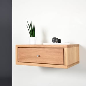 small floating bedside table in solid oak wood with 1 drawer