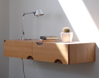 Floating entryway console in bamboo with 2 carved drawers