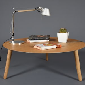 Mid-century round coffee table in oak and Cor-Ten steel