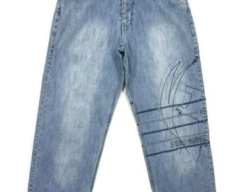 Jeans Hip Hop da Uomo Larghi Cargo in Denim Pantaloni Lunghi da Strada Stile Hipster Gamba Dritta Rap Con Due Grandi Tasche Sulle Ginocchia Vintage Y2K Anni '90 Jeans Hip Hop da Uomo Larghi Cargo in Denim Pantaloni Lunghi da Strada Stile Hipster Gamba Dritta Rap Con Due Grandi Tasche Sulle Ginocchia Vintage Y2K Anni '90