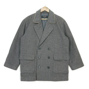 May include: A gray double-breasted peacoat with a brown collar and two flap pockets. The coat has five black buttons.