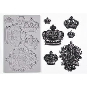 May include: A gray silicone mold with various crown designs and a collection of black crown-shaped embellishments. The mold features detailed relief patterns, while the embellishments showcase intricate textures and ornate details, suitable for crafting projects.