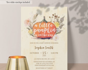 May include: A baby shower invitation featuring a watercolour illustration of a pumpkin with autumn foliage and the text "a little pumpkin is on the way". The invitation is for Sophia Smith and is scheduled for 15th October at 3:00 PM. The address is 123 Patch Rd. NYC, NY. 12345. Please RSVP by 1st October to Lori at (555) 555-5555. The invitation also includes the website printedhearts.etsy.com and states that the recipient is registered at Target.