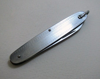 Chinese c.1960 Vintage Stainless Steel Penknife. Stamped China / arrows. Mid century.