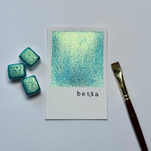 Betta shimmer blue aqua glitter watercolor paint half pan for calligraphy, painting, coloring