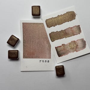 Russ brown orange shimmer watercolor paint half pan for calligraphy, art, crafts, lettering, pointed pen, detail art