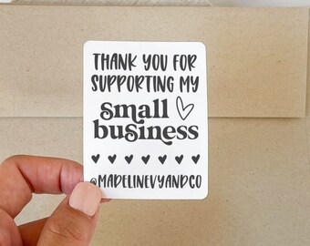 May include: A white thank you card with black text that reads "Thank you for supporting my small business" with a heart symbol. There are five small hearts below the text and the text "Madelinevanpco" at the bottom.