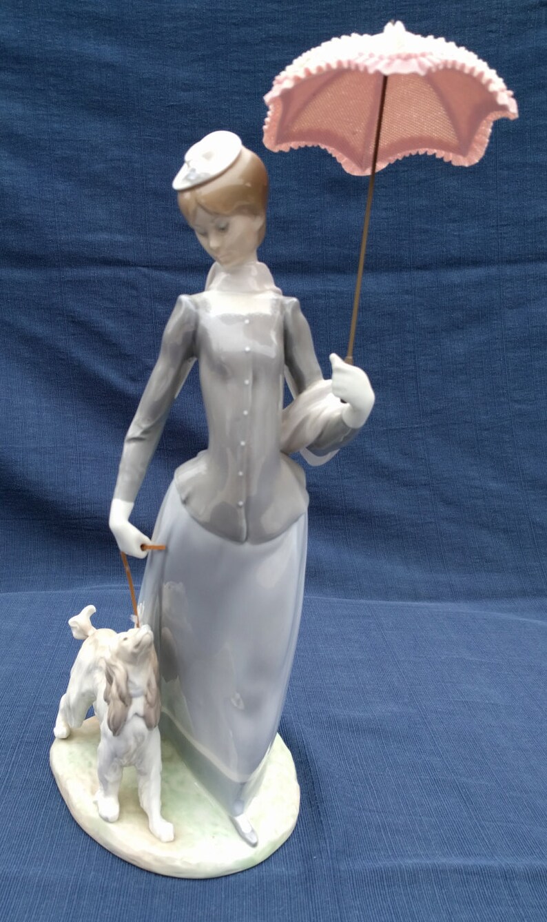lladro lady with parasol and dog