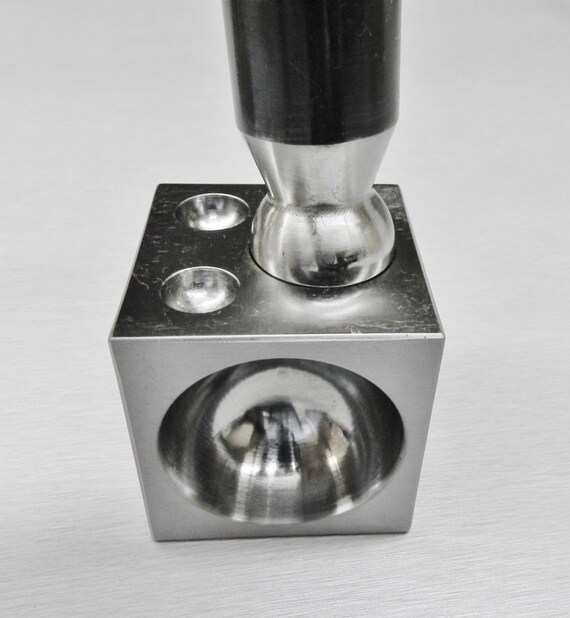 Dapping block outlet coin ring